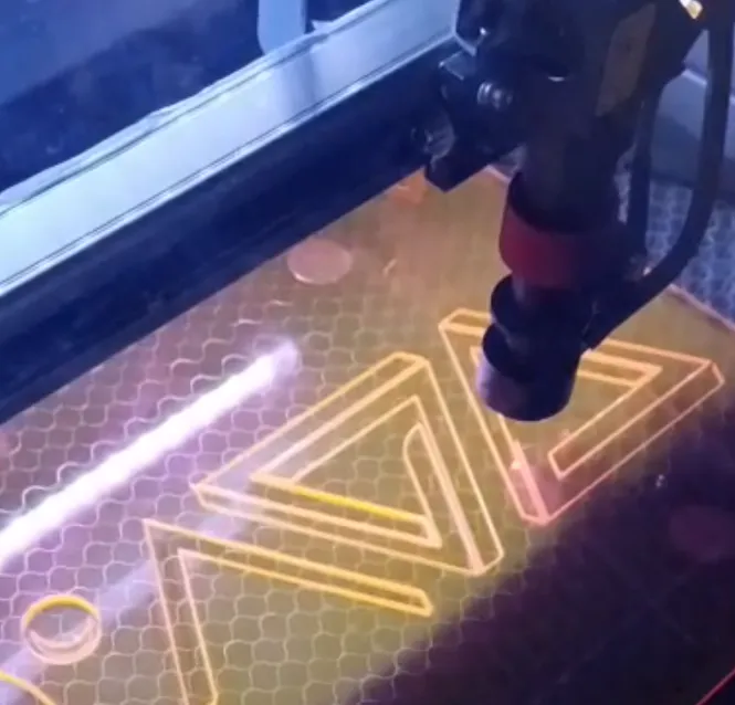 CO2 laser cutting an acrylic sheet