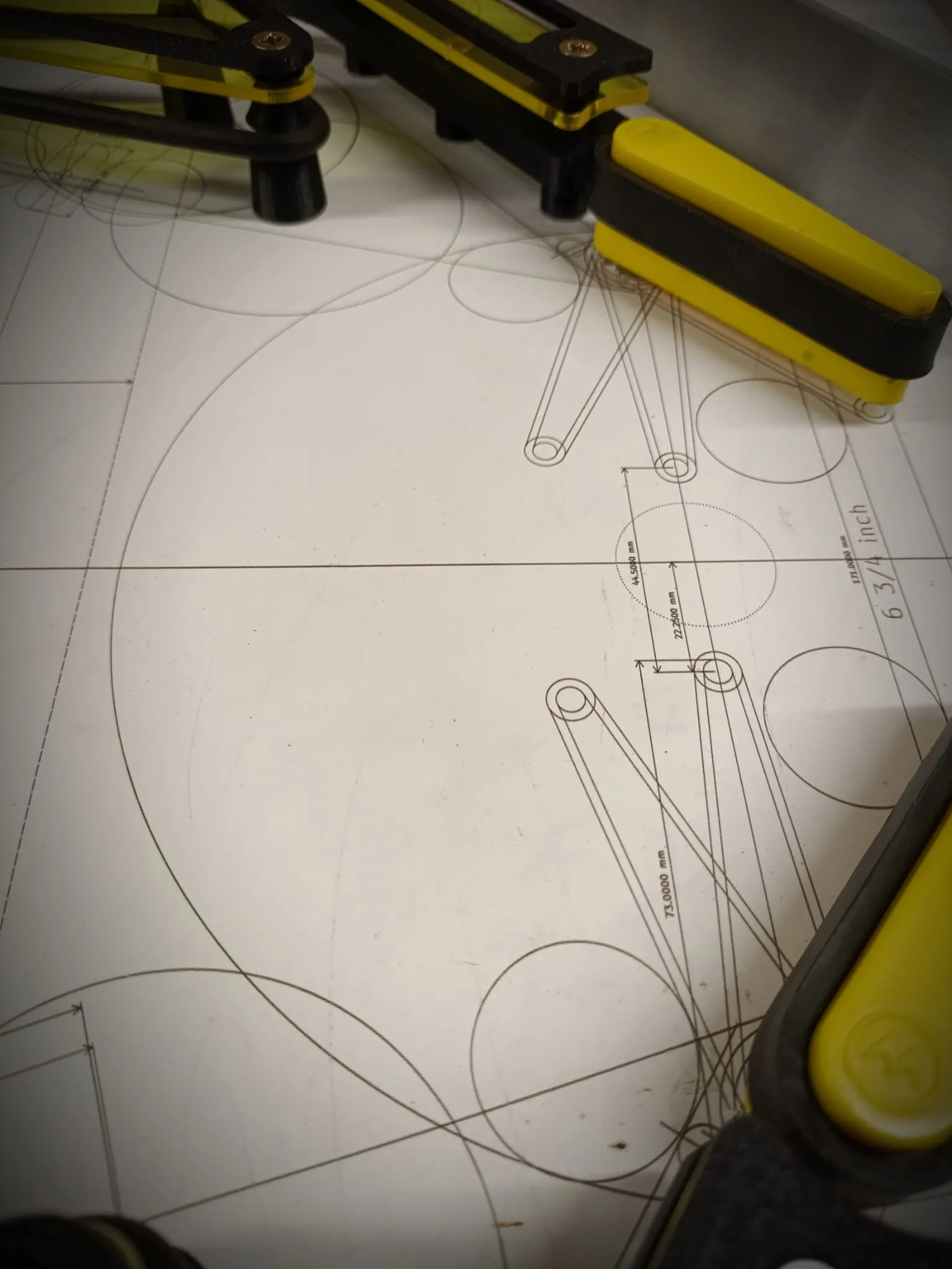 Lower section of a prototype pinball machine whitewood with a technical drawing overlay